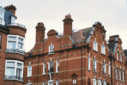 a large brick building with lots of windows