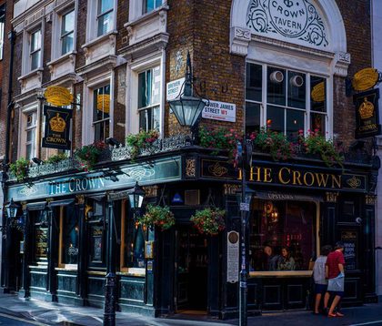Charming street view of The Crown Tavern in Soho, London.