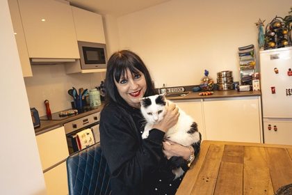 Karen Hill with her house cat.