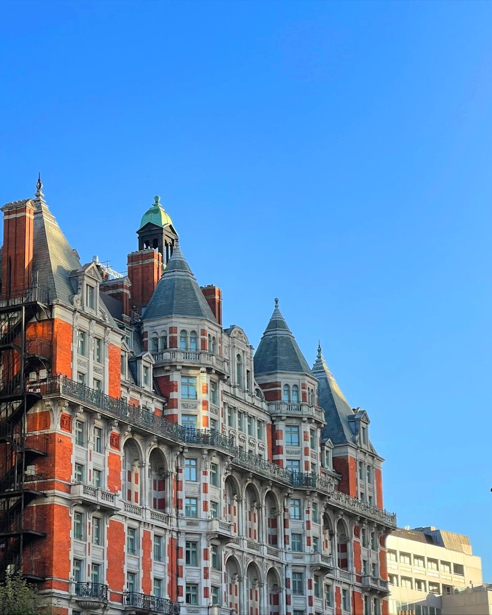 a large building with a clock on the top of it