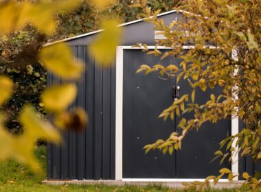 a small shed with a door and a window