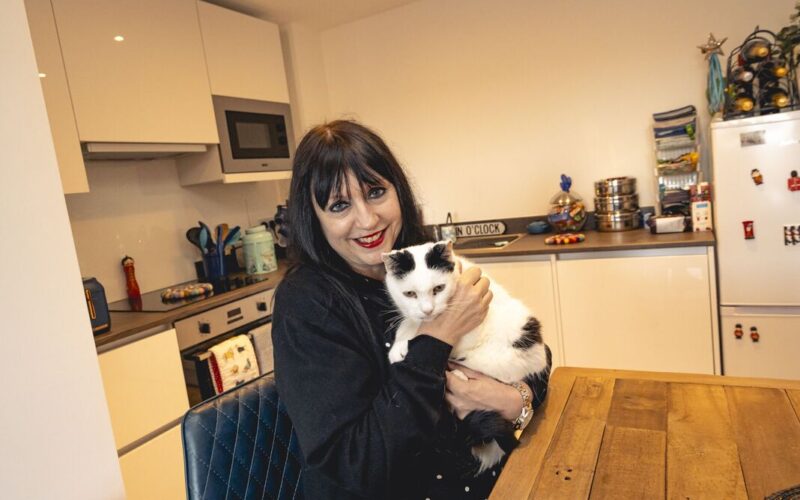 Karen Hill with her house cat.