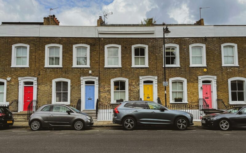 a building with cars parked in front