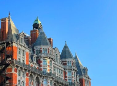 a large building with a clock on the top of it