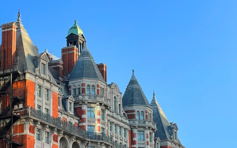 a large building with a clock on the top of it