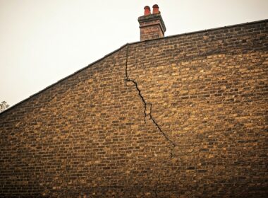 Cracked wall on side of property